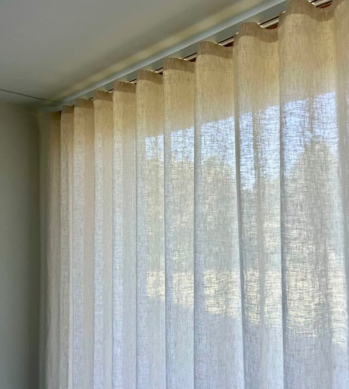 Hoe hang je wave gordijnen op?